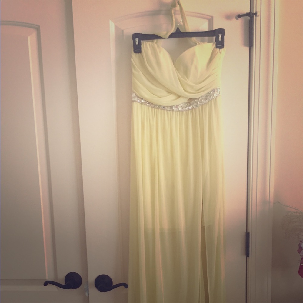 Sheer, slit, pastel yellow prom dress